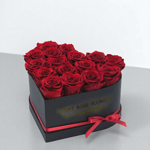 Red roses in a heart shape box