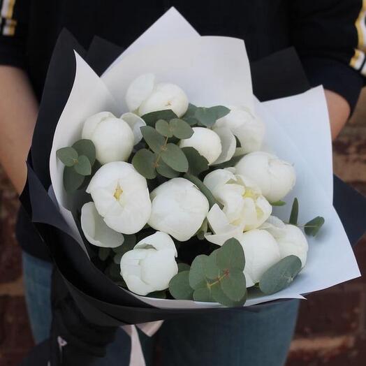 Bouquet of white peonies and eucalyptus
