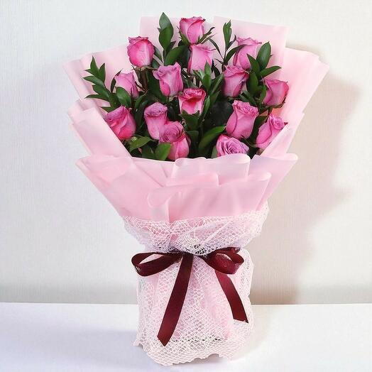 Purple rose hand bouquet