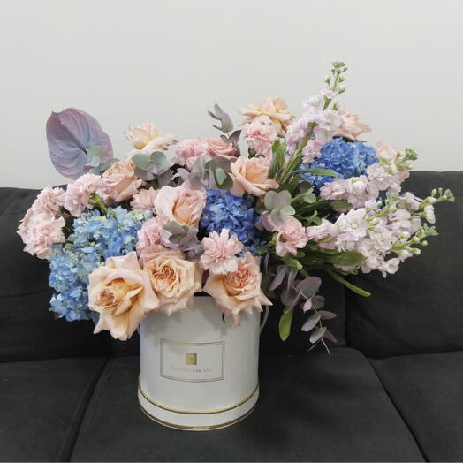 Rosas color melocotón con caja