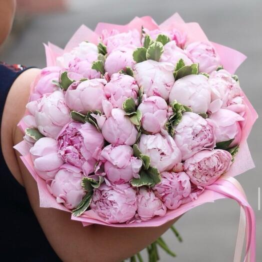 Bouquet of pink peonies and greenery