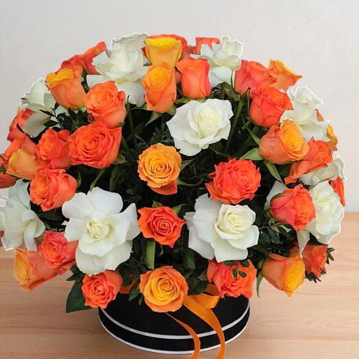50 stems of mix roses in a round box