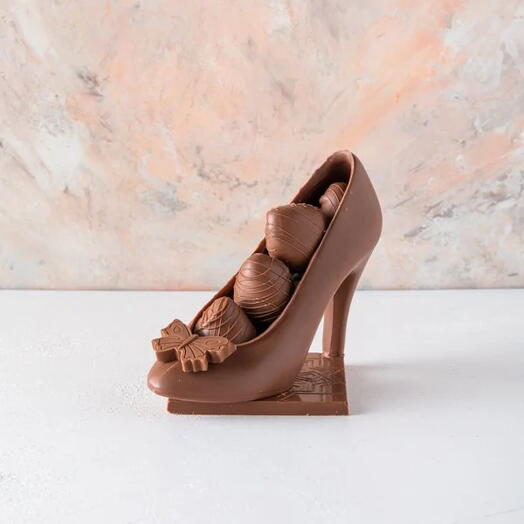 Zapato comestible de chocolate con bayas