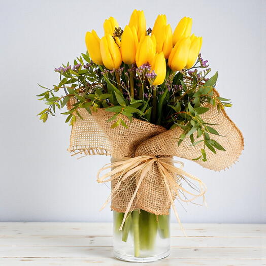 Vibrant tulips in a rustic vase