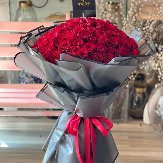 Bouquet surprise de 101 roses rouges