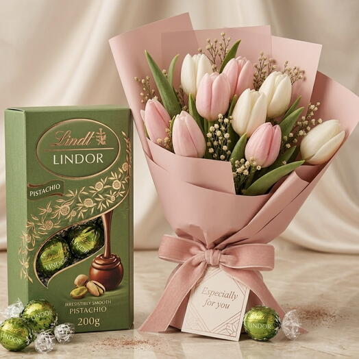 9 бело-розовых тюльпанов с фисташковым шоколадом Lindt, 200 г | Доставка по Дубаю