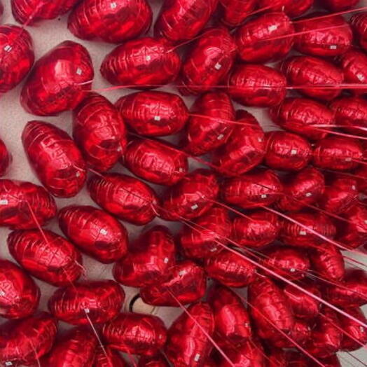 100 helium red heart balloons under ceiling