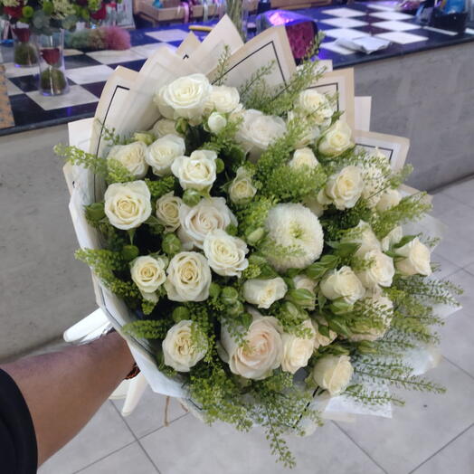 White baby roses and white roses with green bell flower bouquet