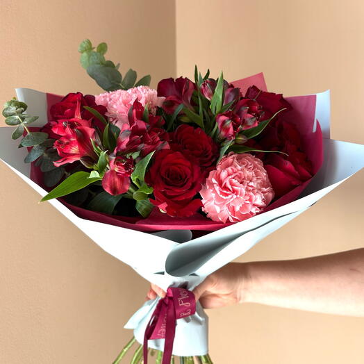 Blushing romance bouquet with red roses , blush carnations and deep red alstromeria