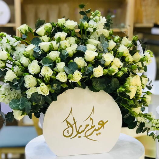 White baby rosess in box arrangement