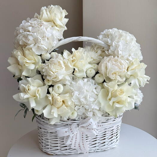 Basket of white flowers for her