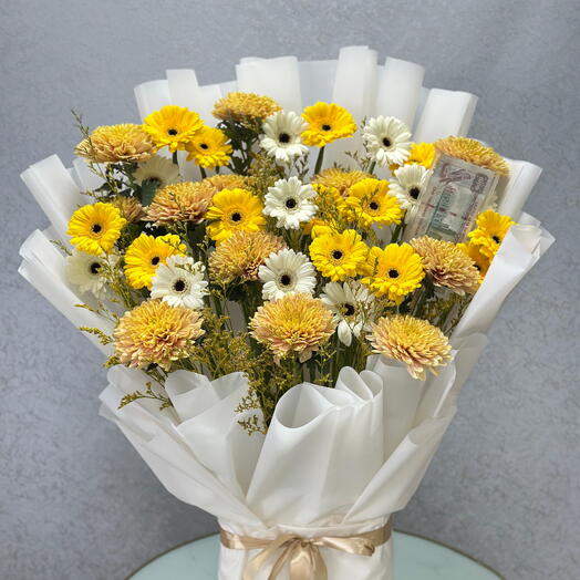 White and yellow gerbera arrangement