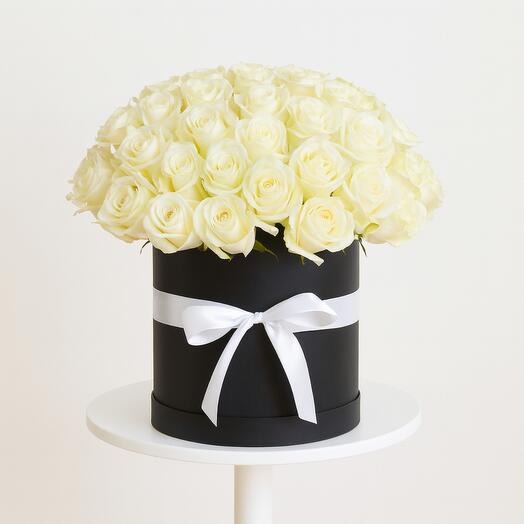 Boîte de roses blanches ruban blanc