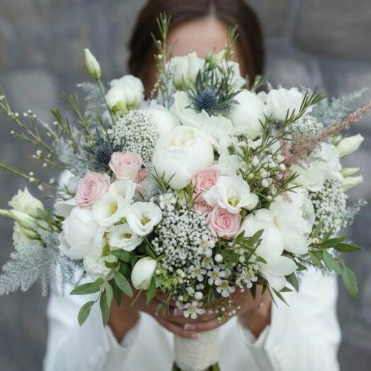Wedding bouquet with peony and roses