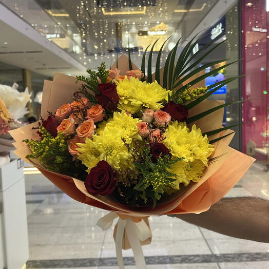 Mix yellow and red flowers boiuquet