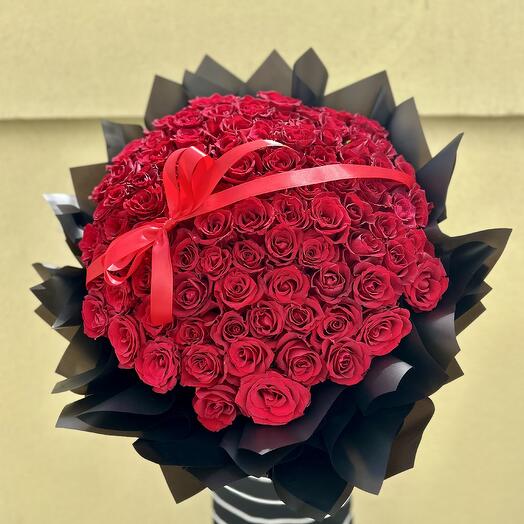 100 Red roses with black wrapping