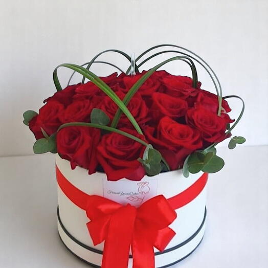 Deep red roses in a box