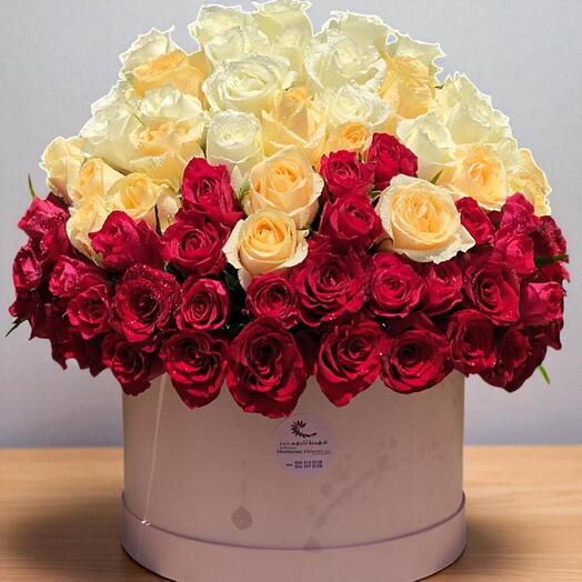 Summer sun: 80 Stems Of Mix Roses in a Pink Round Box (one side arrangement)