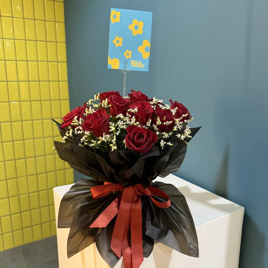Hotline Bloom - red roses in black wrapping Valentines Day