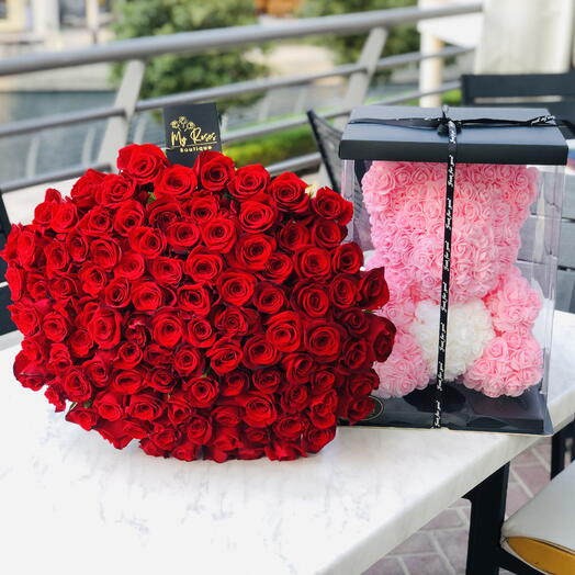 100 красных роз с поролоновым розовым медвежонком 40 см
