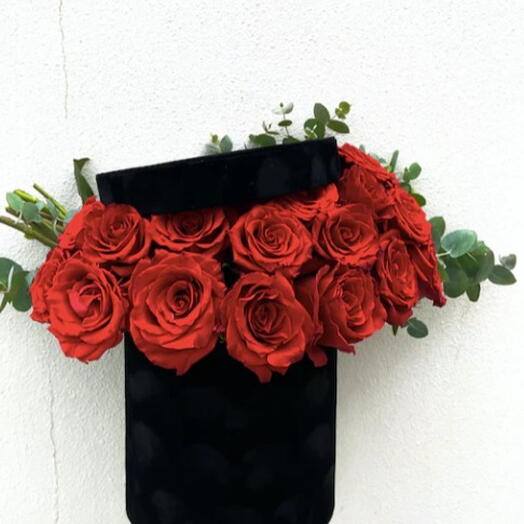 Red roses in Enchanted Black Velvet box