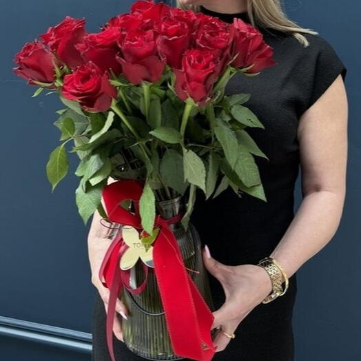 31 red roses in a vase