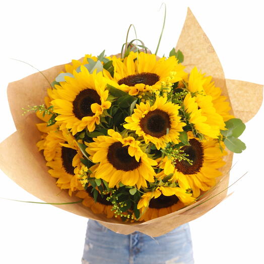 Bright sunflowers in rustic wrap